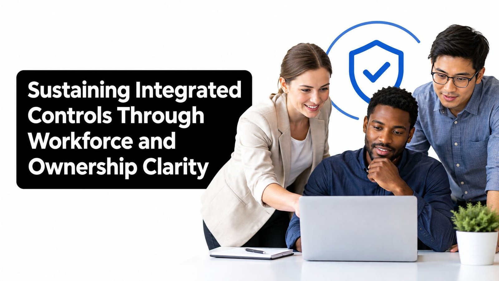 A professional team of three people collaborating on a laptop project in a bright office environment.